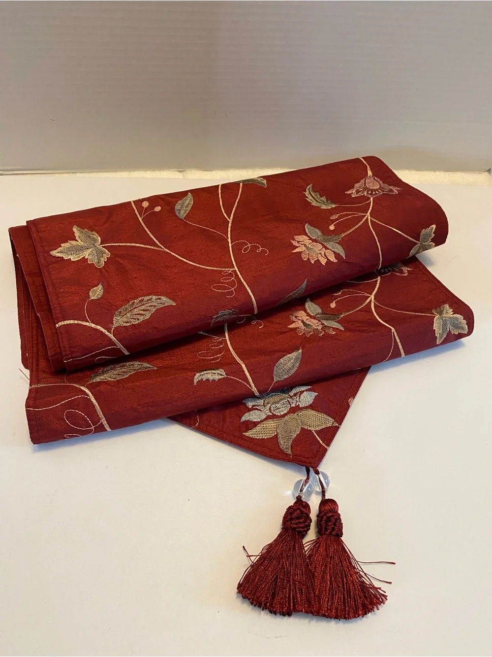 Table Runner Embroidered floral fabric multicolor on dark wine red W Tassels